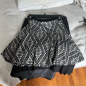Aqua(Bloomingdales) black and white patterned circle skirt.